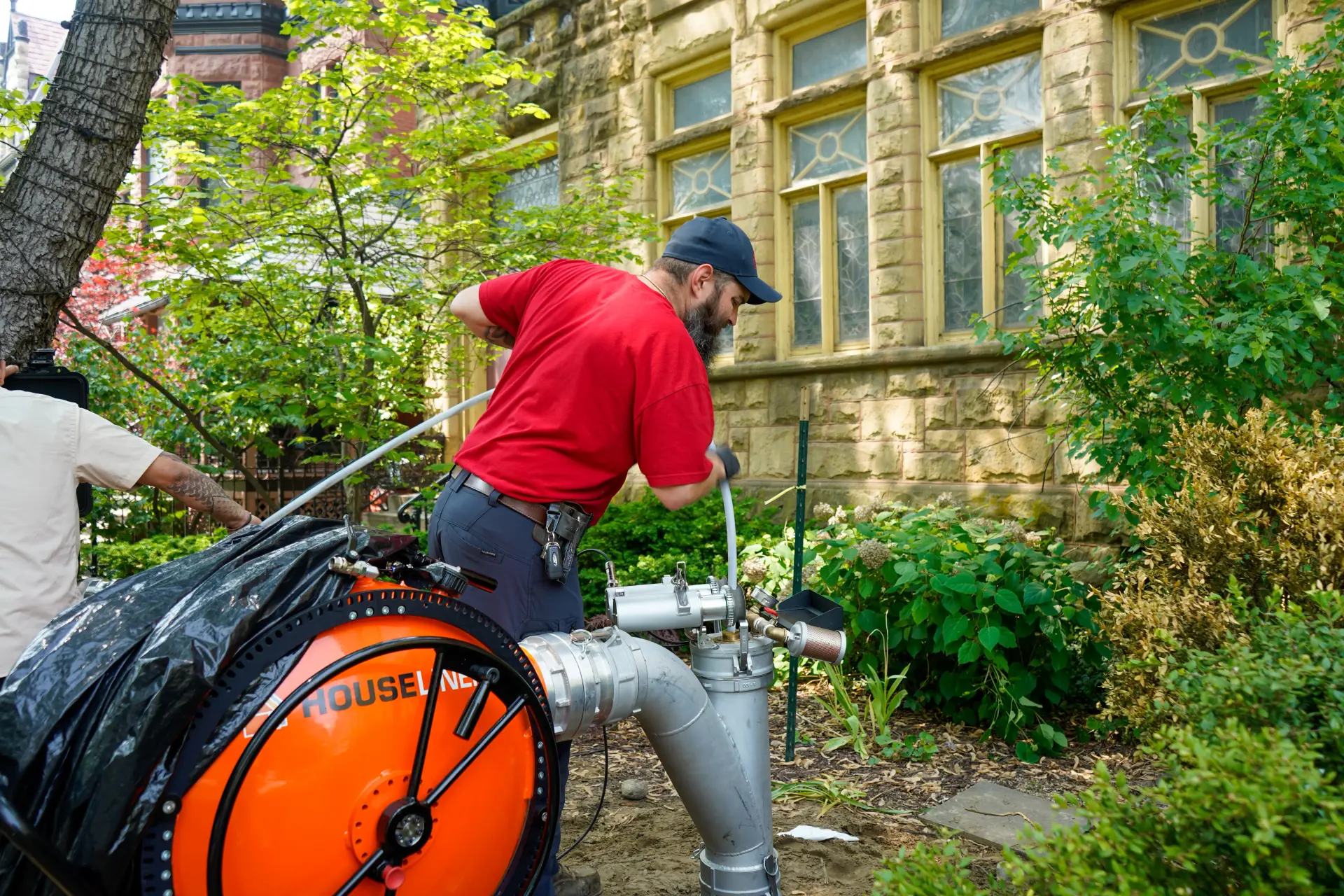 J. Blanton technician working on a Chicago sewer line